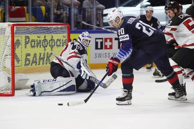 Ice hockey Eishockey - IIHF WC, USA vs CAN COPENHAGEN,DENMARK,20.MAY.18 - ICE HOCKEY - IIHF World Championships, match for third place, USA vs Canada. Image shows Curtis Mcelhinney (CAN) and Chris Kreider (USA). GEPAxpictures xAndreasxPranter