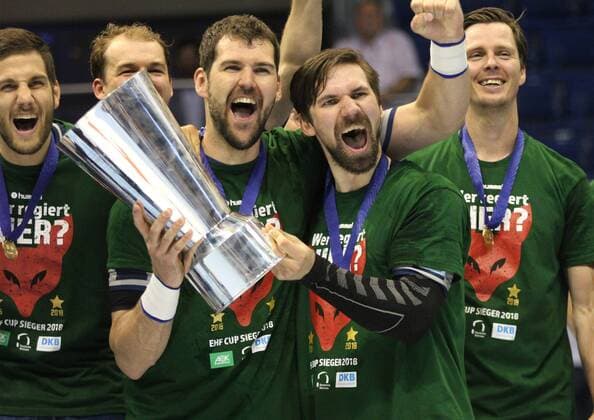 20 05 2018 xcsx Handball EHF Cup Final 4 Handball EHF Cup Final 4 Final Saint Raphael Var Handball foxes Berlin emspor v l Jakob Gojun Foxes Berlin and Fabian Wiede Foxes Berlin cheer with the trophy Foxes Berlin celebrate their Victory Cup Trophy Magdeburg