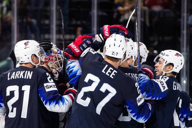 180520 United States players cheer for the win in the bronze match in the ice hockey World Cup between USA and Canada on May 20, 2018 in Copenhagen  Copyright: PETTERxARVIDSON BB180520PA058
