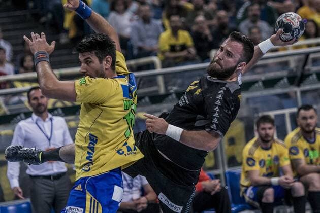 (180521) -- ATHENS, May 21, 2018 -- A.E.K. s Eldin Vrazalica (R) competes during the EHF Men s Challenge Cup Finals between A.E.K. Athens and AHC Potaissa Turda in Athens, Greece, May 20, 2018. ) (SP)GREECE-ATHENS-HANDBALL-MEN S CHALLENGE CUP-FINALS PanagiotisxMoschandreou 