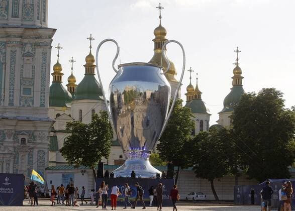 May 23, 2018 - Kiev, Ukraine - A giant replica of the UEFA Champions League trophy is seen near St. Sophia Cathedral in center of Kiev, Ukraine, on 23 May 2018. Real Madrid will face Liverpool FC in the UEFA Champions League final at the NSC Olimpiyskiy stadium in Kiev on 26 May 2018. UKRAINE UEFA CHAMPIONS LEAGUE FINAL 2018 - ZUMAg194 20180523_zap_g194_009 Copyright: xSergxGlovnyx