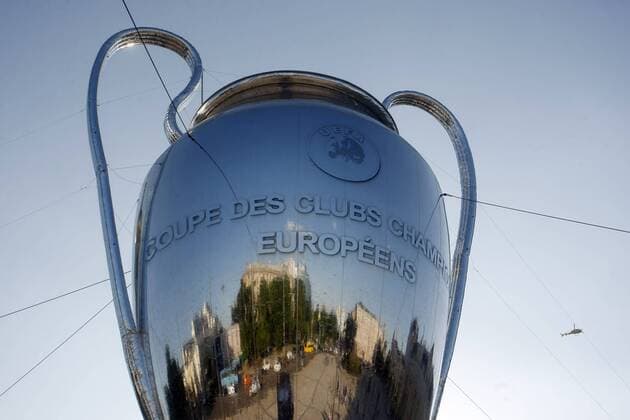 May 23, 2018 - Kiev, Ukraine - A helicopter flies near of a giant replica of the UEFA Champions League trophy, near St. Sophia Cathedral in center of Kiev, Ukraine, on 23 May 2018. Real Madrid will face Liverpool FC in the UEFA Champions League final at the NSC Olimpiyskiy stadium in Kiev on 26 May 2018. UKRAINE UEFA CHAMPIONS LEAGUE FINAL 2018 - ZUMAg194 20180523_zap_g194_015 Copyright: xSergxGlovnyx
