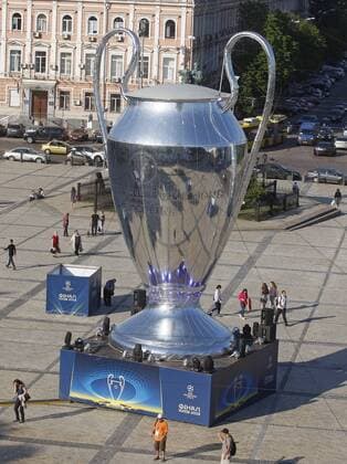 May 23, 2018 - Kiev, Ukraine - A giant replica of the UEFA Champions League trophy is seen near St. Sophia Cathedral in center of Kiev, Ukraine, on 23 May 2018. Real Madrid will face Liverpool FC in the UEFA Champions League final at the NSC Olimpiyskiy stadium in Kiev on 26 May 2018. UKRAINE UEFA CHAMPIONS LEAGUE FINAL 2018 - ZUMAg194 20180523_zap_g194_017 Copyright: xSergxGlovnyx
