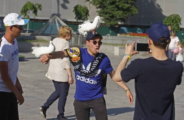 May 23, 2018 - Kiev, Ukraine - A fan of Real Madrid poses for a photo in center of Kiev, Ukraine, 23 May, 2018.Kiev is preparing for the 2018 UEFA Champions League Final football match between Real Madrid and Liverpool FC next May 26 at the Olimpiyskiy Stadium. Real Madrid v Liverpool - UEFA Champions League Final Previews  - ZUMAn230 20180523_zaa_n230_1178 Copyright: xStrx
