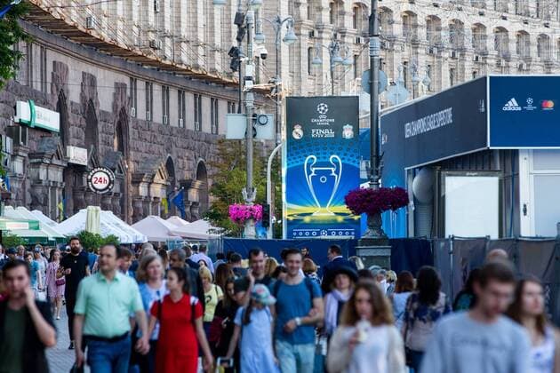 SOCCER - UEFA Men Women CL KIEV,UKRAINE,23.MAY.18 - SOCCER - UEFA Men Women Champions League, final, preview. Image shows the people and the sign at 2018 UEFA Champions League Final fan zone. GEPAxpictures xMaticxKlansek