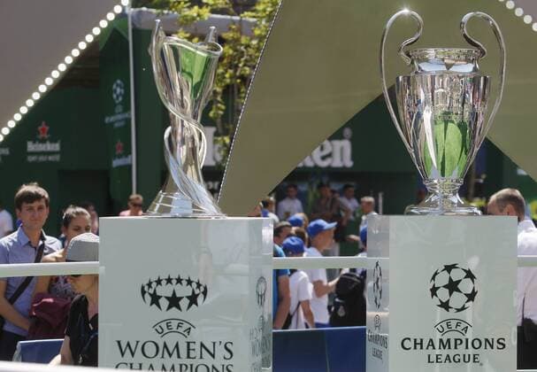 May 24, 2018 - Kiev, Ukraine - People look at the UEFA Champions League trophies during the opening ceremony of a Champions Festival in Kiev, Ukraine, on 24 May, 2018. Real Madrid will face Liverpool FC in the UEFA Champions League final at the NSC Olimpiyskiy stadium in Kiev on 26 May 2018. Real Madrid vs Liverpool FC - ZUMAg194 20180524_zap_g194_002 Copyright: xSergxGlovnyx