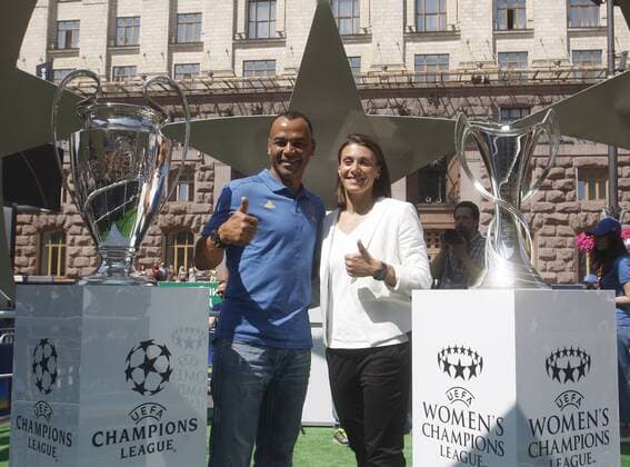 May 24, 2018 - Kiev, Ukraine - CAFU(L), former soccer player of Milan and IYA ANDRUSCHAK(R), Ukrainian national soccer player and ambassador for the UEFA Women s Champions League final, pose with the UEFA Champions League trophies during the opening ceremony of a Champions Festival in Kiev, Ukraine, on 24 May, 2018. Real Madrid will face Liverpool FC in the UEFA Champions League final at the NSC Olimpiyskiy stadium in Kiev on 26 May 2018. Real Madrid vs Liverpool FC - ZUMAg194 20180524_zap_g194_012 Copyright: xSergxGlovnyx