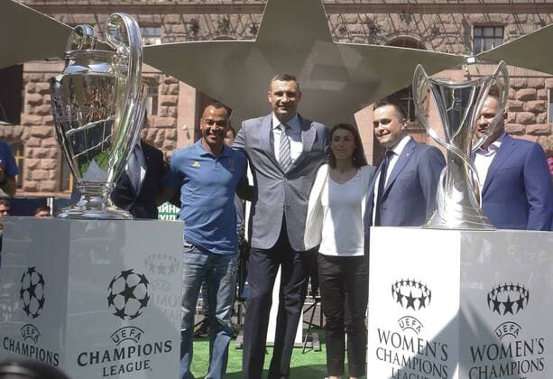 May 24, 2018 - Kiev, Ukraine - Kyiv City Mayor Vitalii Klitschko (C), UEFA s Ambassador of Women Champions League final Iya Andrushchak (C-R) and former soccer player of Milan Cafu (L), carry the Champions league trophies, during the opening ceremony of the Champions Festival in the UEFA Champions League Final fan zone in Kyiv, Ukraine, 24 May, 2018. The Champions Festival will be held in fan zone on May 24-27 in Kyiv during the final matches of the UEFA ChampionsÃ¢â‚¬â ¢ League among men and women. Real Madrid v Liverpool - UEFA Champions League Final Previews  - ZUMAn230 20180524_zaa_n230_589 Copyright: xStrx