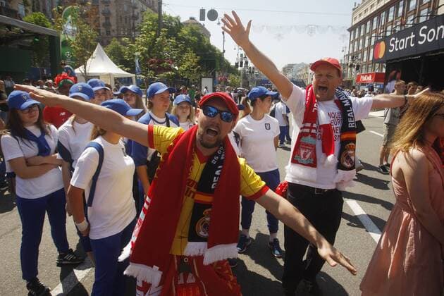 May 24, 2018 - Kiev, Ukraine - Liverpool FC fans react, during the opening ceremony of the Champions Festival in the UEFA Champions League Final fan zone in Kyiv, Ukraine, 24 May, 2018. The Champions Festival will be held in fan zone on May 24-27 in Kyiv during the final matches of the UEFA ChampionsÃ¢â‚¬â ¢ League among men and women. Real Madrid v Liverpool - UEFA Champions League Final Previews  - ZUMAn230 20180524_zaa_n230_602 Copyright: xStrx