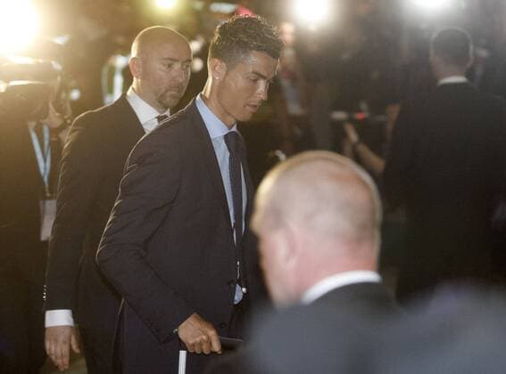 May 24, 2018 - Kiev, Ukraine - Real Madrid s CRISTIANO RONALDO (C) as the team arrive at the team s hotel in Kiev, Ukraine, on 24 May, 2018. Real Madrid will face Liverpool FC in the UEFA Champions League final at the NSC Olimpiyskiy stadium in Kiev on 26 May 2018. Real Madrid vs Liverpool FC - ZUMAg194 20180524_zap_g194_044 Copyright: xSergxGlovnyx
