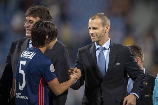 Saki Kumagai of Lyon and Aleksander Ceferin Uefa President during the UEFA Women s Champions League Final match between VfL Wolfsburg 1-4 Olympique Lyon at Valeriy Lobanovskyi Dynamo Stadium in Kiev, Ukraine, on May 24, 2018. Noxthirdxpartyxsales  (78857187)