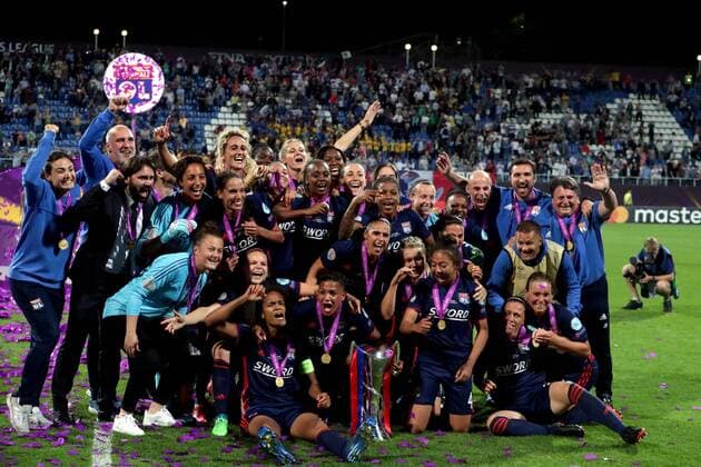 Players and coaches of Lyon celebrate upon winning the 2018 UEFA Women s Champions League title for the 5th time after the final match against VfL Wolfsburg at the Valeriy Lobanovskyi Dynamo Stadium in Kyiv, capital of Ukraine, May 24, 2018. Ukrinform. KYIV. Olympique Lyonnais (Lyon) has claimed the 5th UEFA Women s Champions League title and the third in a row. French players beat VfL Wolfsburg 4-1 in the final game at the Valeriy Lobanovskyi Dynamo Stadium on May 24. Despite Wolfsburg?s forward Pernille Harder scoring an opener, midfielders Amandine Henry, Eugenie Le Sommer, Camille Abily and forward Ada Hegerberg quashed all hopes for the German squad. Lyon triumphs over Wolfsburg, wins 5th Champions League title in Kyiv  Copyright: xPavlo_Bagmutx