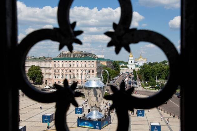 SOCCER - UEFA CL final, Liverpool vs Real, preview KIEV,UKRAINE,25.MAY.18 - SOCCER - UEFA Champions League, final, Liverpool FC vs Real Madrid CF, preview. Image shows a general view of the big trophy and in background St. Michael s Golden-Domed Monastery. GEPAxpictures xMaticxKlansek