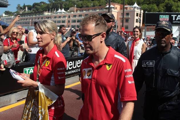 Photo4 LaPresse 25 03 2018 Monte Carlo, Monaco Grand Prix Formula One Monaco 2018 In the pic: Sebastian Vettel (GER) Scuderia Ferrari SF71H and Britta Roeske (AUT) Ferrari Press Officer.  Copyright: xPhoto4 LaPressex
