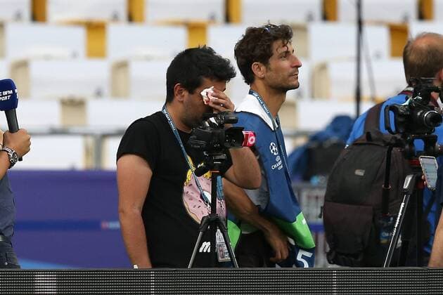 Real Madrid Training Spanish cameraman Lorenzana Prieto of Univision Deportes Network (USA) had his camera hit by a wild shot from Cristiano Ronaldo of Real Madrid which in turn hit him in the face causing a deep cut over his right eye. The Real Madrid star then sent his training top via a member of the backrooom team over to Lorenzana and waved an apology during the Real Madrid training session at the Olympic Stadium, Kiev Content Not Available For UK Newspapers Copyright: xPaulxChestertonx FIL-11836-0006