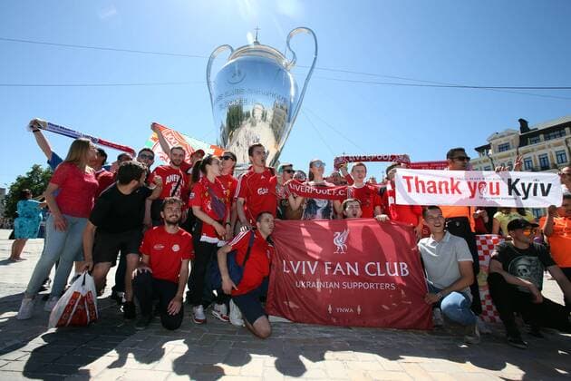 Real Madrid v Liverpool UEFA Champions League Final The Kiev Liverpool Fan Club sing in front of a giant Champions League Trophy before the UEFA Champions League Final at the Olympic Stadium, Kiev Content Not Available For UK Newspapers Copyright: xPaulxChestertonx FIL-11844-0022