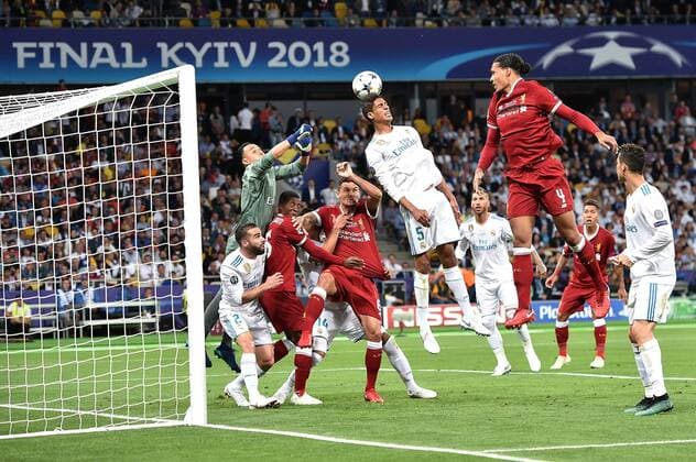 Real Madrid FC Liverpool on 26 05 2018 at the Olympic Stadium in Kiev Raphael Varane Madrid midfield saves in front of Kolo Toure Liverpool right xRx