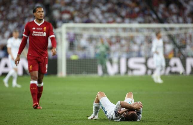 May 26, 2018 - Kiev, Ukraine - Real s defender Dani Carvajal lies after the trauma during the UEFA Champions League Final match at NSC Olipiyskyi stadium in Kyiv, Ukraine, May 26, 2018. Real Madrid v Liverpool - UEFA Champions League Final  - ZUMAn230 20180526_zaa_n230_1110 Copyright: xSergiixKharchenkox