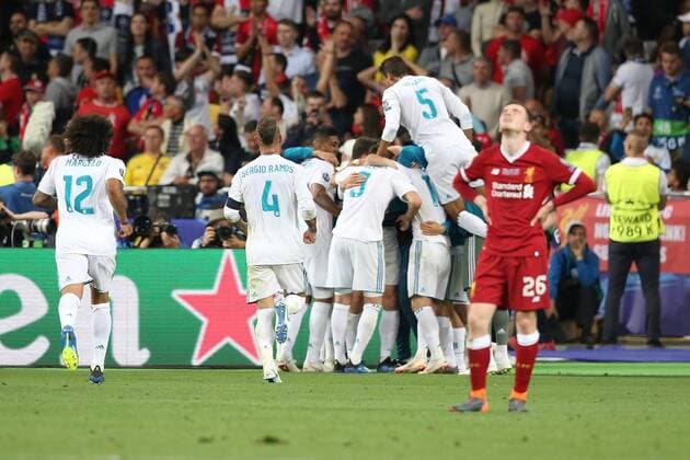 Real Madrid v Liverpool UEFA Champions League Final Andrew Robertson of Liverpool looks dejected as Gareth Bale of Real Madrid celebrates scoring his side?s 3rd goal during the UEFA Champions League Final at the Olympic Stadium, Kiev Content Not Available For UK Newspapers Copyright: xPaulxChestertonx FIL-11844-0152