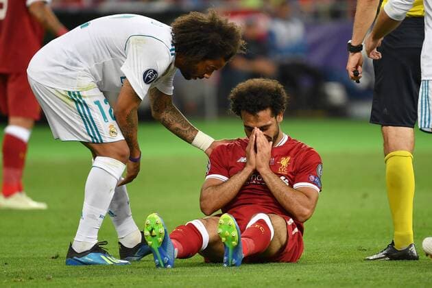 Marcelo da Silva Junior Real Madrid defeats Mohamed SALAH Liverpool injured on the grass injury disappointed frustrated dejected Football Champions League Final 2018 Real Madrid Liverpool 3 1 Season2017 18 at 26 05 2018 Stadium NSK Olimpiyskyi