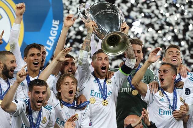 (180527) -- KIEV, May 27, 2018 -- Sergio Ramos (C) of Real Madrid holds the trophy after the UEFA Champions League final match between Liverpool and Real Madrid in Kiev, Ukraine on May 26, 2018. Real Madrid claimed the title with 3-1. ) (SP)UKRAINE-KIEV-CHAMPIONS LEAGUE-LIVERPOOL-REAL MADRID Sergey 