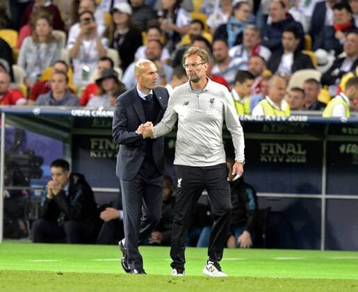 26 05 2018 Football UEFA Champions League Final 2018 Real Madrid FC Liverpool at the Olympic Stadium Kiev Ukraine Coach Jürgen Klopp re Liverpool faces coach Zinedine Zidane and Real Madrid to congratulate him on the score of 3 1 for Madrid