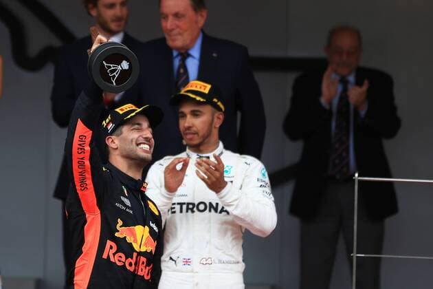 27th May 2018, Circuit de Monaco, Monaco, Monte Carlo; Monaco Formula 1 Grand Prix, race day; Aston Martin Red Bull Racing TAG Heuer, Daniel Ricciardo celebrates as he comes first in Monaco with Lewis Hamliton applauding  ActionPlus12029749 Octane