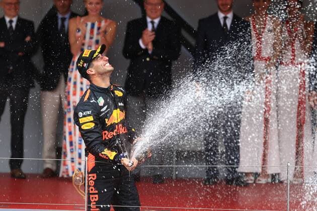 27th May 2018, Circuit de Monaco, Monaco, Monte Carlo; Monaco Formula 1 Grand Prix, race day; Aston Martin Red Bull Racing TAG Heuer, Daniel Ricciardo comes first in Monaco and gets a champagne shower from 3rd placed Lewis Hamilton  ActionPlus12029767 Octane
