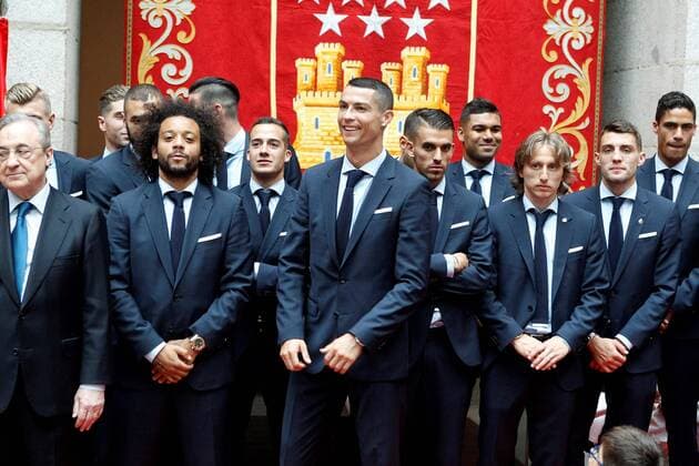 Real Madrid s players Cristiano Ronaldo (C), Marcelo Vieira (2L) and teammates attend a reception at the Madrid regional government s headquarter in Madrid, Spain, 27 May 2018. Real Madrid defeated 3-1 Liverpool in the UEFA Champions League final at the NSC Olimpiyskiy stadium in Kiev on 26 May 2018. Real Madrid celebration in Madrid !ACHTUNG: NUR REDAKTIONELLE NUTZUNG!  Copyright: xVictorxLerenax GRAF7188 20180527-636630532346498708