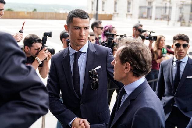 Cristiano Ronaldo CR7, at the Cathedral of the Almudena in Madrid on May 27, 2018 as Real MadridÂ s football players arrive to celebrate winning their third Champions League title in a row in Kiev.  xJosuxMondelox xCordonxPressx xRealxMadridxCelebratexAfterxVictoryxInxThexChampionsxLeaguexFinax