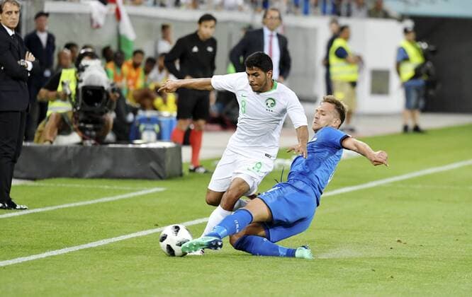 28 05 2018 St Gallen Switzerland Soccer Men Season 2017 2018 Test match Italy Saudi Arabia Image shows 4 Domenico Criscito Italy against 8 Yahia Alshehri Saudi Arabia Action duel