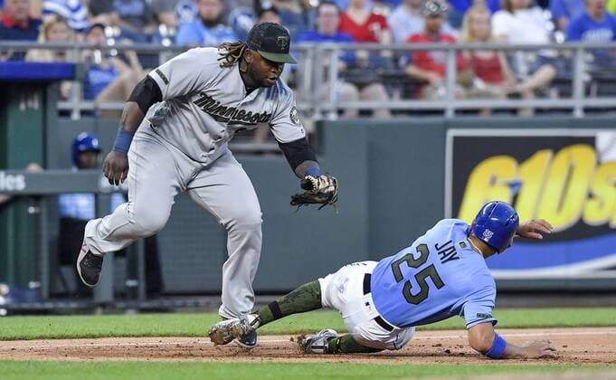 May 28, 2018 - Kansas City, MO, USA - Kansas City Royals Jon Jay is tagged out by Minnesota Twins third baseman Miguel Sano on a fielders choice hit into by Whit Merrifield in the seventh inning during Monday s baseball game on May 28, 2018, at Kauffman Stadium in Kansas City, Mo. Twins vs Royals - ZUMAm67_ 20180528_zaf_m67_031 Copyright: xJohnxSleezerx