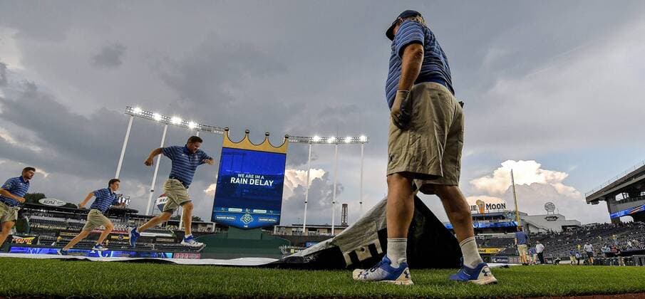 May 29, 2018 - Kansas City, MO, USA - The Kansas City Royals tarp crew runs into position to uncover the field following a rain delay before the start of a game against the Minnesota Twins on Tuesday, May 29, 2018, at Kauffman Stadium in Kansas City, Mo. Minnesota at Kansas City - ZUMAm67_ 20180529_zaf_m67_033 Copyright: xJohnxSleezerx