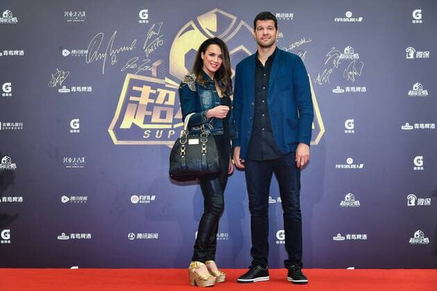 German former player Michael Ballack, right, and his girlfriend Natacha Tannous pose on the red carpet for the 2018 Super Penguin Soccer Celebrity Game in Shanghai, China, 2 June 2018. Football stars heat up red carpet for 2018 Super Penguin Soccer Celebrity Game in Shanghai  20180602_85758
