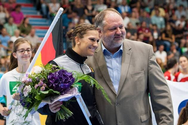 Flowers for 50 international caps Julia Behnke of DHB President Andreas Michelmann Germany vs Turkey Handball EC Qualification Women 02 06 18 Gummersbach NRW Germany Schwalbe Arena Copyright: xcdn_nszx