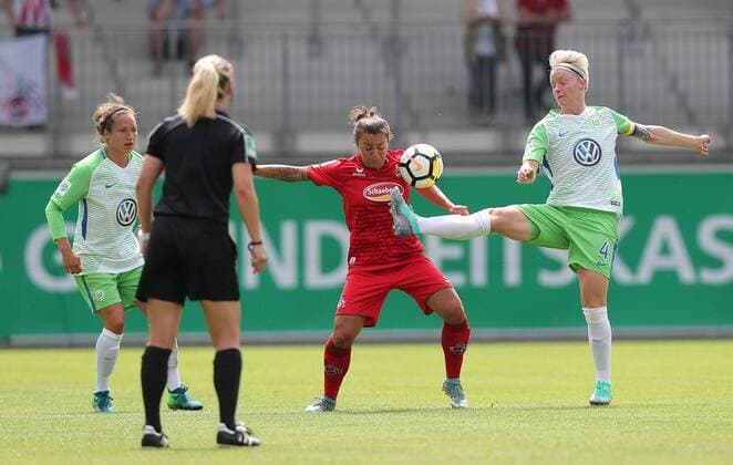 Nilla Fischer VfL Wolfsburg in a duel