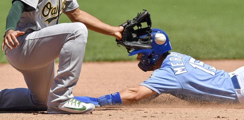 June 3, 2018 - Kansas City, MO, USA - Kansas City Royals Whit Merrifield steals second ahead of the throw to Oakland Athletics shortstop Marcus Semien in the sixth inning on Sunday, June 3, 2018, at Kauffman Stadium in Kansas City, Mo. Oakland Athletics vs. Kansas City Royals - ZUMAm67_ 20180603_zaf_m67_027 Copyright: xJohnxSleezerx