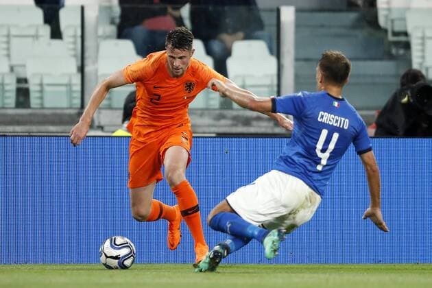 (l-r) Hans Hateboer of Holland, Domenico Criscito of Italy during the International Friendly Länderspiel match between Italy and The Netherlands at Allianz Stadium on June 04, 2018 in Turin, Italy International friendly match 2017 2018 xVIxVIxImagesx xMauricexvanxSteenxIVx 11130931