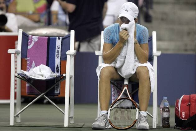 - NEW YORK, USA : Belgian Justine Henin-Hardenne wiped her face during her women final match against Maria Sharapova of Russia at the US Open Tennis tournament, Saturday 09 September 2006, in Flushing Meadows, New York. Sharapova won 6-4, 6-4. DIDIERxMOSSIAT  x5013802x