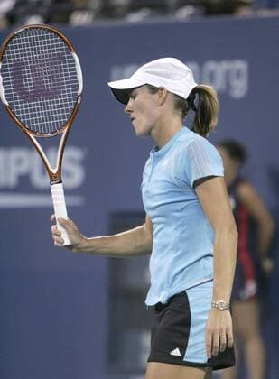 - NEW YORK, USA : Belgian Justine Henin-Hardenne reacts during her women final match against Maria Sharapova of Russia at the US Open Tennis tournament, Saturday 09 September 2006, in Flushing Meadows, New York. Sharapova won 6-4, 6-4. DIDIERxMOSSIAT  x5013813x