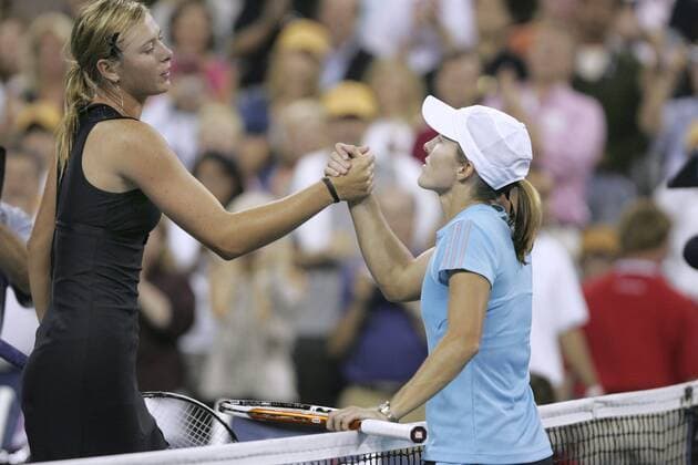 - NEW YORK, USA : Belgian Justine Henin-Hardenne (R) and Maria Sharapova of Russia (L) after their women final match at the US Open Tennis tournament, Saturday 09 September 2006, in Flushing Meadows, New York. Sharapova won 6-4, 6-4. DIDIERxMOSSIAT  x5013866x
