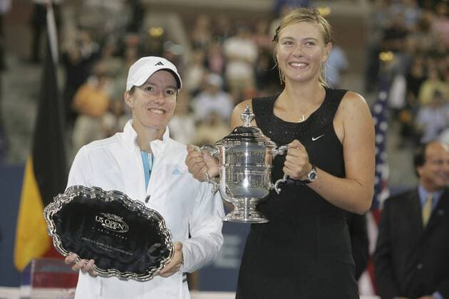 - NEW YORK, USA : Belgian Justine Henin-Hardenne (L) and Maria Sharapova of Russia (R) pose with their trophy during the award ceremony after their women final match at the US Open Tennis tournament, Saturday 09 September 2006, in Flushing Meadows, New York. Sharapova won 6-4, 6-4. DIDIERxMOSSIAT  x5013954x