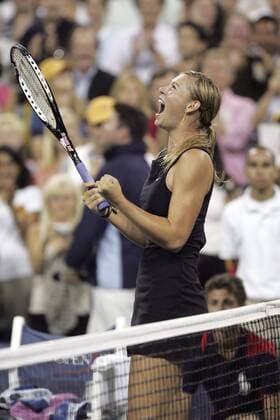 - NEW YORK, USA : Maria Sharapova of Russia celebrates after defeating Belgian Justine Henin-Hardenne in the women final match at the US Open Tennis tournament, Saturday 09 September 2006, in Flushing Meadows, New York. Sharapova won 6-4, 6-4. DIDIERxMOSSIAT  x5014147x