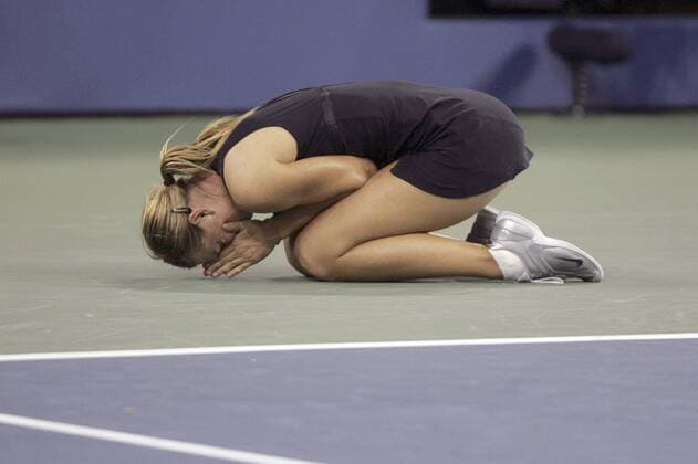 - NEW YORK, USA : Maria Sharapova of Russia celebrates after defeating Belgian Justine Henin-Hardenne in the women final match at the US Open Tennis tournament, Saturday 09 September 2006, in Flushing Meadows, New York. Sharapova won 6-4, 6-4. DIDIERxMOSSIAT  x5014164x