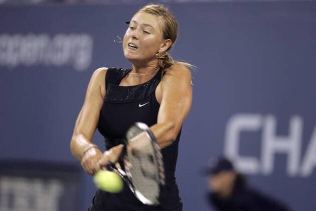 - NEW YORK, USA : Maria Sharapova of Russia defeats Belgian Justine Henin-Hardenne in the women final match at the US Open Tennis tournament, Saturday 09 September 2006, in Flushing Meadows, New York. Sharapova won 6-4, 6-4. DIDIERxMOSSIAT  x5014173x