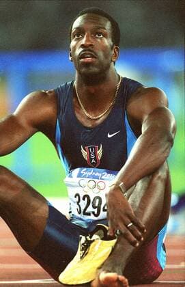 BRU67--SYDNEY,AUSTRALIA : Michael Johnson of the US seems tired after his race running in the men s 400m semifinal 1 during the Sydney Olympic Games Olympische Spiele Olympia OS Johnson placed second in the race with 44.65. The men s 400m final is scheduled to be run 25 September. PHOTO BELGA REPORTERS Philippe  x512475x