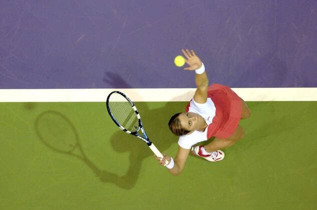 20061108 - MADRID, SPAIN : Belgian Kim Clijsters hits a serve during her round robin match against Russian Maria Sharapova at the WTA Tennis Damen tennis Masters, Wednesday 08 November 2006, in Madrid. PHILIPPExBUISSIN  x5452851x