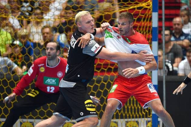 v left Patrick WIENCEK GER Myrhol BJARTE NOR action duel textile sample handball Laenspiel der Maenner Germany GER Norway NOR on 06 06 2018 Olympiahalle in Muenchen