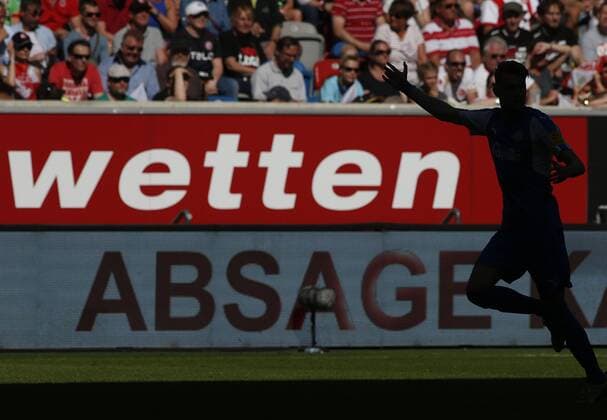 Soccer Dusseldorf Germany 2 Bundesliga 33 Gameday Fortuna Dusseldorf vs Holstein Kiel 1 1 in the Esprit Arena in Dusseldorf on 06 05 2018 Silhouette of a soccer player in front of the advertising board promoting sports bets
