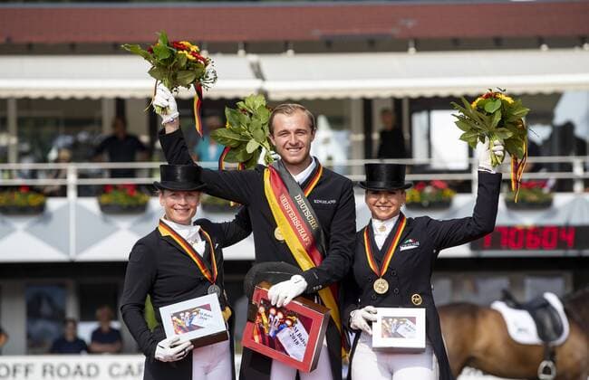Themen der Woche - SPORT KW23 Bilder des Tages - SPORT Balve - Optimum Deutsche Meisterschaft Dressur und Springen 2018, WERTH Isabell (GER), ROTHENBERGER SoÌˆnke (GER), SCHNEIDER Dorothee (GER) Balve - Optimum Deutsche Meisterschaft Dressur und Springen 2018 Meisterehrung Deutsche Meisterschaft Grand Prix Spezial 09. Juni 2018 Â© - *** Balve Optimum German Championship Dressage and Jumping 2018 WERTH Isabell GER ROTHENBERGER SoÌnke GER SCHNEIDER Dorothee GER Balve Optimum German Championship Dressage and Jumping 2018 Master Class German Championship Grand Prix Special 09 June 2018 ©